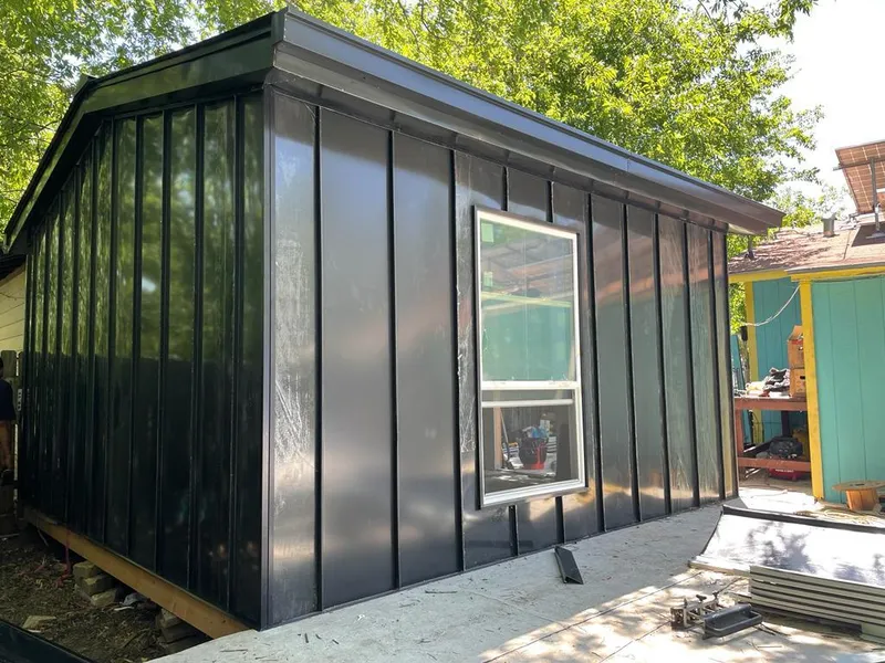 Black standing seam metal wall panels for Metal Roof Installation in Plant City